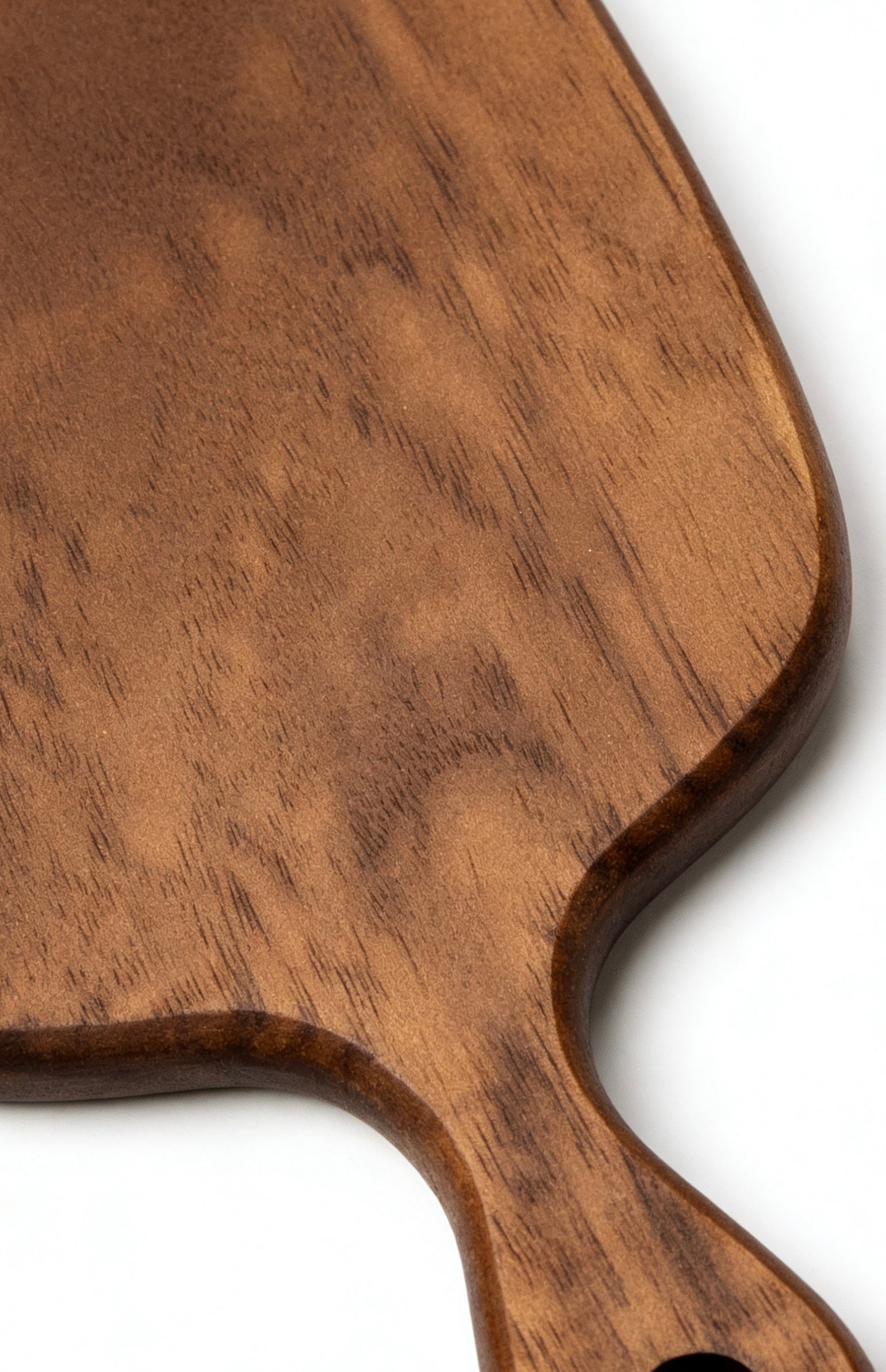 Close-up of striking natural walnut grain contrast with a smooth food-safe finish - Radiant Glow